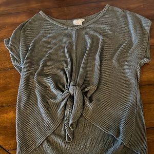 Size small T-shirt with tie in the front.
